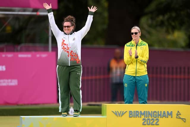Lucy Beere of Team Guernsey acknowledge the crowd during the medal ceremony (Getty Images)