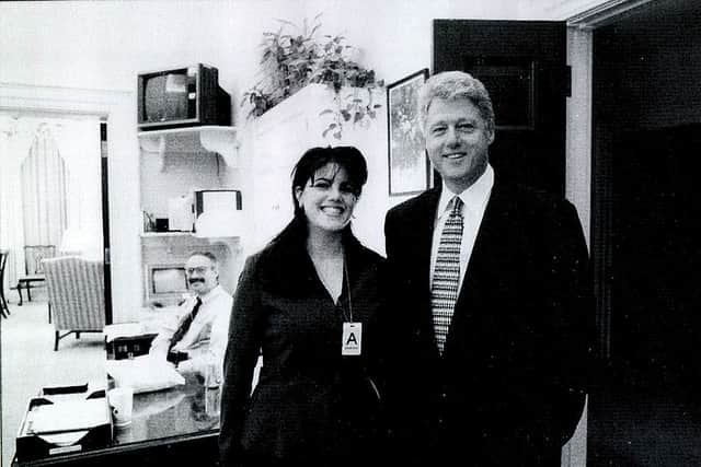 A photograph showing former White House intern Monica Lewinsky meeting President Bill Clinton at a White House function submitted as evidence in documents by the Starr investigation and released by the House Judicary committee September 21, 1998. (Photo: Getty Images)
