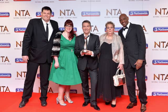 Mark Labbett, Jenny Ryan, Bradley Walsh, Anne Hegerty and Shaun Wallace pose with the award for Best Daytime Show for 'The Chase' at the 21st National Television Awards 