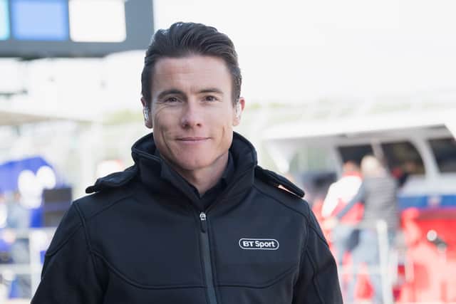  James Toseland of Great Britain looks on in pit during the MotoGp Of Great Britain