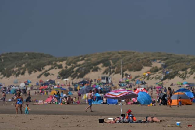 Camber Sands is a major hub for sunseekers (image: AFP/Getty Images)