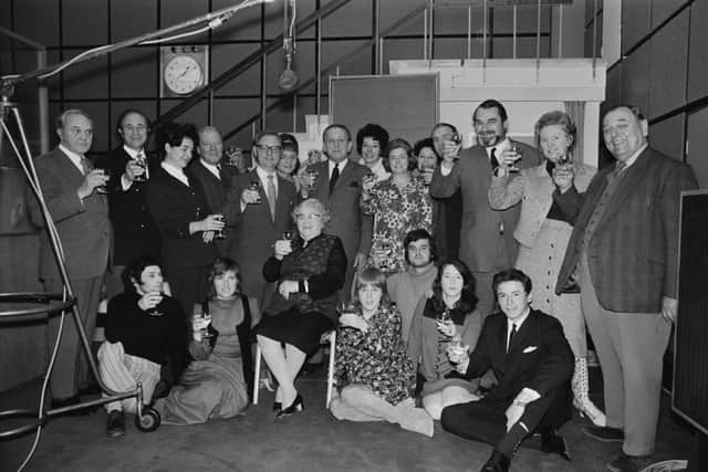 The cast of the radio show 'The Archers' celebrate 21 years on the air, UK, 30th November 1971. The line-up includes cast members Chris Gittins, Leslie Dunn, Patricia Greene, Philip Garston-Jones, Norman Painting, Ysanne Churchman, Edgar Harrison, Anne Cullen, June Spencer, Pauline Seville, Colin Skipp, Jack Holloway, Bob Arnold, Alaric Cotter, Judy Bennett, Gwen Berryman, Angela Piper, Jeremy Mason, Elizabeth Marlowe, Alan Devereux, Julia Mark and producer Tony Shryane.  (Photo by Victor Blackman/Express/Hulton Archive/Getty Images)