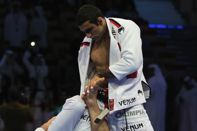 (L-R) Victor Estima of Brazil competes with Leandro Lo in the Men’s black belt 82kg finals during the Abu Dhabi World Professional Jiu-Jitsu Championship in April 2014 (Photo: Francois Nel/Getty Images)