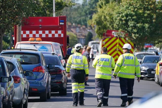 Gas staff at scene in Galpin’s Road in Thornton Heath, south London, where a house has collapsed amid a fire and explosion (Photo: PA/Dominic Lipinski)
