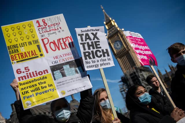 Protesters attend a demonstration in Parliament Square about the rising cost of living and energy bills (Photo: Chris J Ratcliffe/Getty Images)