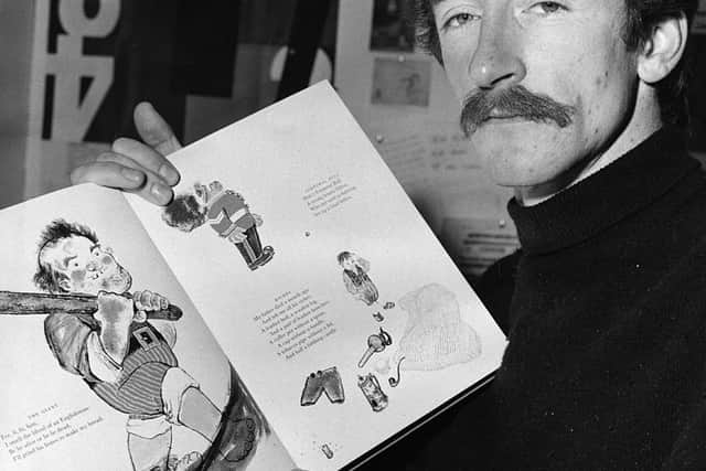 Artist and writer Raymond Briggs with some of his prize winning illustrations from the children's book 'The Mother Goose Treasury'.    (Photo by Fox Photos/Getty Images)
