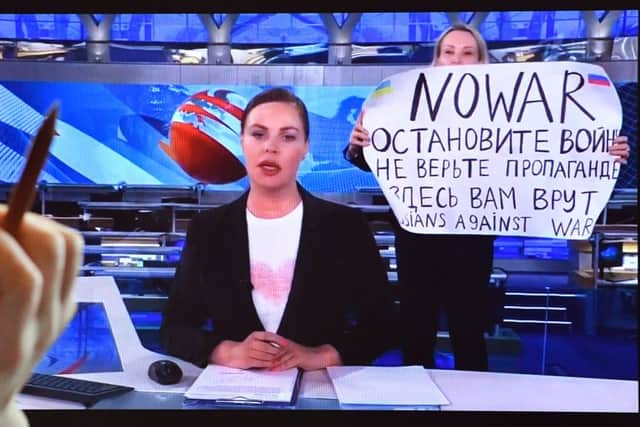 Marina Ovsyannikova staged a protest against the war in Ukraine on live TV 