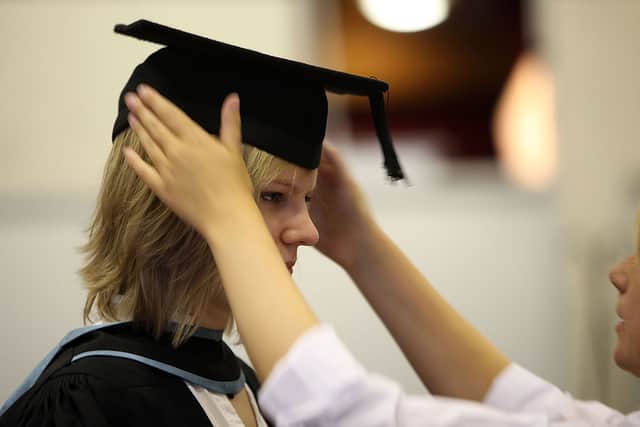 UK student loan interest rates are set to be reduced by the government (image: Getty Images)