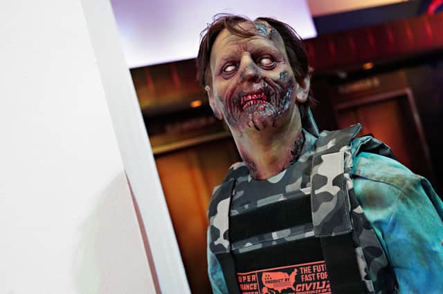 A zombie figure is displayed in the lobby of Madame Tussauds for Halloween on October 31, 2020 in New York City. (Photo by Cindy Ord/Getty Images)