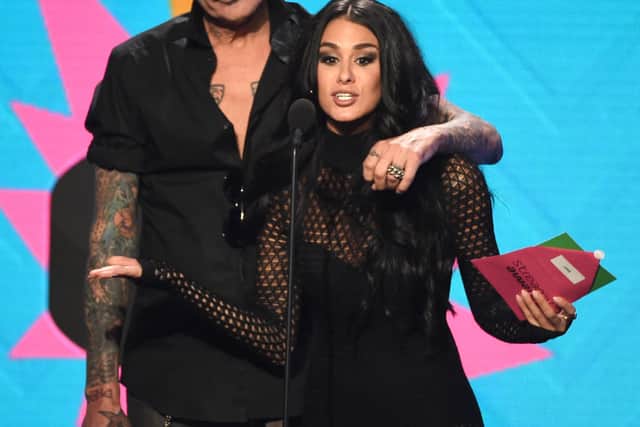 Tommy Lee and Brittany Furlan onstage during the 2017 Streamy Awards at The Beverly Hilton Hotel on September 26, 2017 in Beverly Hills, California.  (Photo by Kevin Winter/Getty Images for dick clark productions)