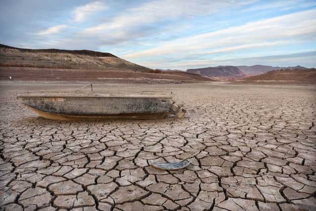 A formerly sunken boat rests on a now-dry section of lakebed at Lake Mead (Pic: Getty Images)