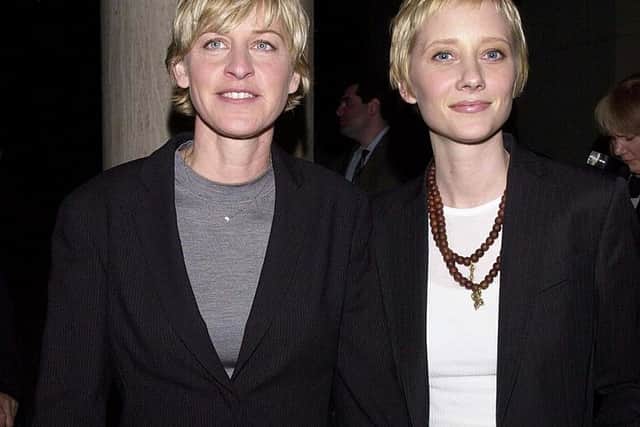 Ellen DeGeneres (L) and actress Anne Heche arrive 19 February, 2000 at the annual Human Rights fundraising dinner in Los Angeles, CA  (Photo by JIM RUYMEN/AFP via Getty Images)
