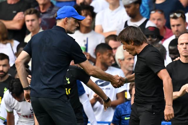 Not exactly a friendly handshake... Tuchel and Conte post-match (AFP via Getty Images)