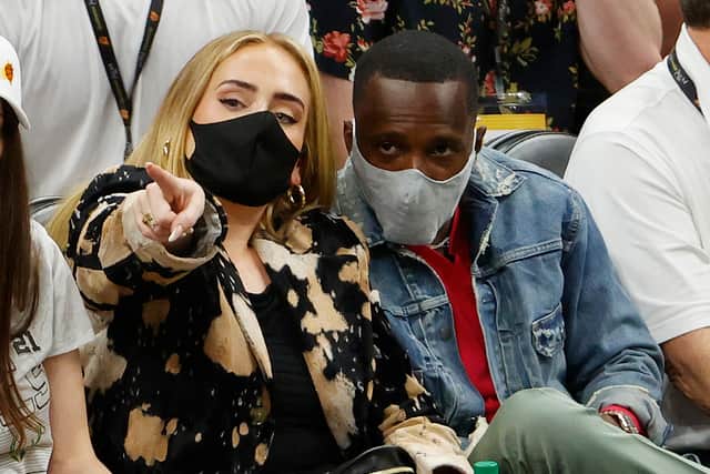 Singer Adele looks on next to Rich Paul during the first half in Game Five of the NBA Finals 