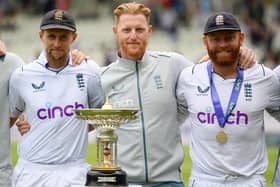 Ben Stokes (c) with Root (l) and Bairstow celebrate Test series win