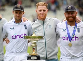 Ben Stokes (c) with Root (l) and Bairstow celebrate Test series win
