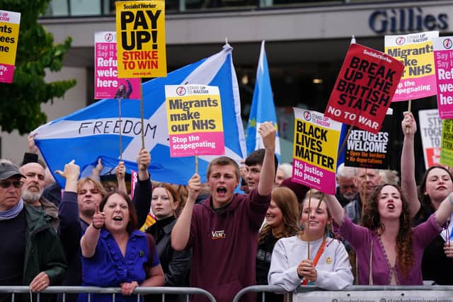 Protesters gathered outside the Perth Concert Hall where the Tory leadership hustings was taking place. (Credit: PA)