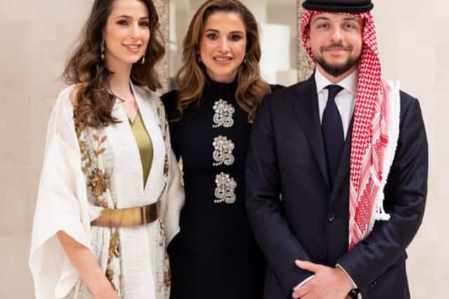 Queen Rania with the happy couple.