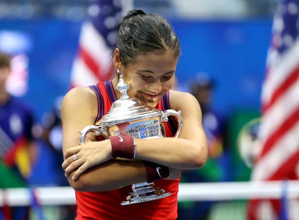 <p>Raducanu with her US Open trophy in 2021</p>