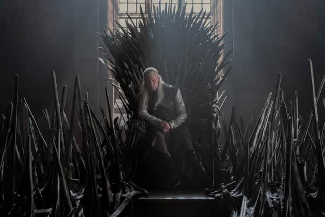 Matt Smith as Daemon Targaryen, sat atop the Iron Throne (Credit: HBO) 
