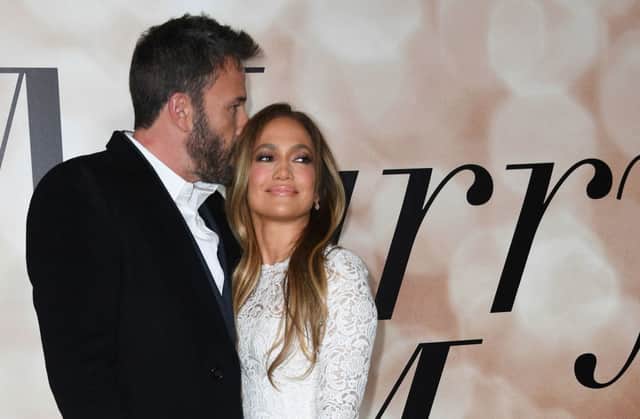 Jennifer Lopez and actor Ben Affleck arrive for a special screening of “Marry Me” at the Directors Guild of America (DGA) in Los Angeles, February 8, 2022. (Photo by VALERIE MACON/AFP via Getty Images)