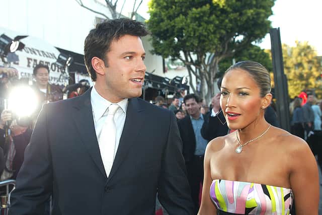 Ben Affleck and Jennifer Lopez arrive at the premiere of “Daredevil” at the Village Theatre on February 9, 2003 in Los Angeles, California. (Photo by Kevin Winter/Getty Images)
