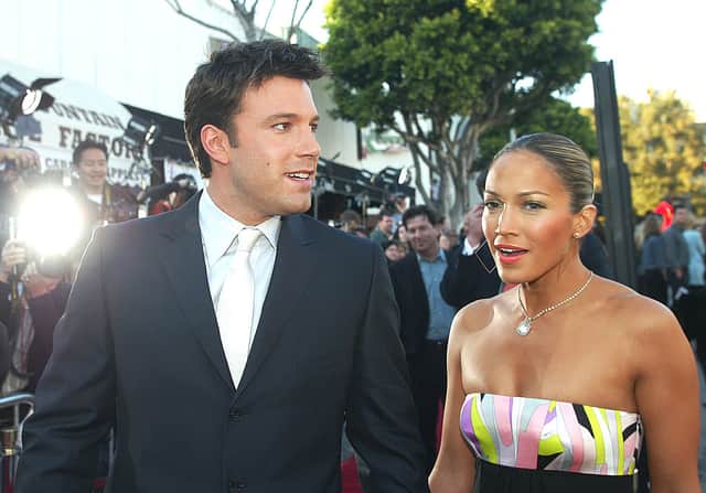 Ben Affleck and Jennifer Lopez arrive at the premiere of “Daredevil” at the Village Theatre on February 9, 2003 in Los Angeles, California. (Photo by Kevin Winter/Getty Images)