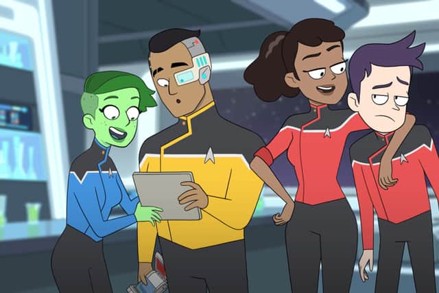 The characters from animated comedy Star Trek: Lower Decks. L-R: D’Vana Tendi, wearing blue; Sam Rutherford, wearing yellow; Beckett Mariner, wearing red; Brad Boimler, also wearing red. (Credit: Paramount+)