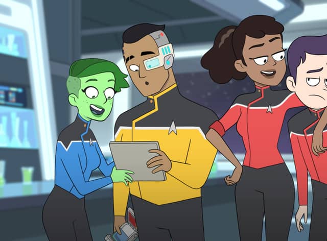 The characters from animated comedy Star Trek: Lower Decks. L-R: D’Vana Tendi, wearing blue; Sam Rutherford, wearing yellow; Beckett Mariner, wearing red; Brad Boimler, also wearing red. (Credit: Paramount+)