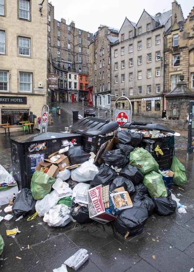 Edinburgh’s Grassmarket, one of the hotspots for the Fringe Festival, has been covered in litter as strikes continue. (Credit: SWNS)