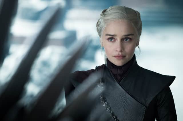Emilia Clarke as Daenerys Targaryen, cold and imposing, dressed in black in Game of Thrones Series 8 (Credit: HBO)