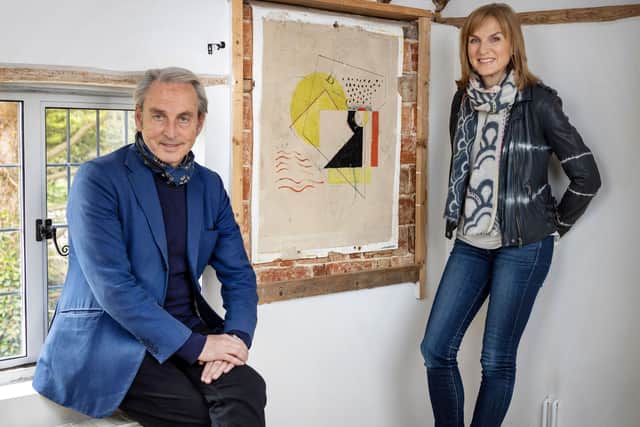 Philip Mould and Fiona Bruce at Red Stream Cottage with possible Ben Nicholson wall painting (Credit: BBC Studios/Anna Gordon)