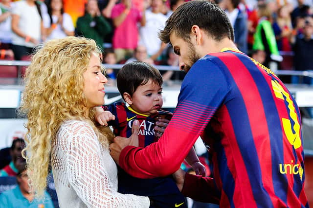Shakira and Gerard Pique of FC Barcelona  are seen with their son Milan prior to the La Liga match between FC Barcelona and Sevilla FC at Camp Nou on September 14, 2013 in Barcelona, Spain.  (Photo by David Ramos/Getty Images)