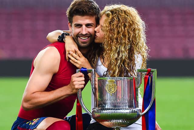 Gerard Pique of FC Barcelona and Shakira pose with the trophy after FC Barcelona won the Copa del Rey Final match against Athletic Club at Camp Nou on May 30, 2015 in Barcelona, Spain.  (Photo by David Ramos/Getty Images)
