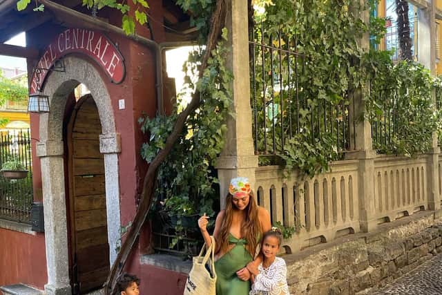 In their holiday photos, Chrissy Teigen can be seen with her mini-me daughter Luna and son Miles (@chrissyteigen - Instagram)