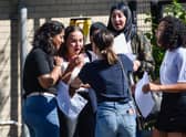 Students react after opening their GCSE exam results on GCSE results day at the City of London Academy, Hackney (Pic: Getty Images)