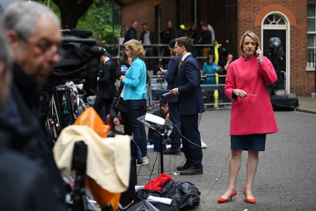 Laura Kuenssberg waits for then Prime Minister Theresa May to deliver a statement outside 10 Downing Street in central London on June 9, 2017 as results from a snap general election show the Conservatives have lost their majority (Photo by JUSTIN TALLIS/AFP via Getty Images)