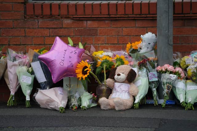 Tributes at the scene in Liverpool where Olivia Pratt-Korbel died.