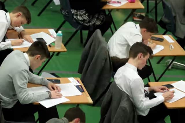 Nationally top  GCSE grades are down on last year but remain higher than pre-pandemic levels