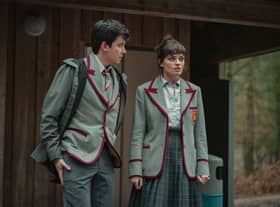  Asa Butterfield as Otis Milburn and Emma Mackey as Maeve Wiley in Sex Education