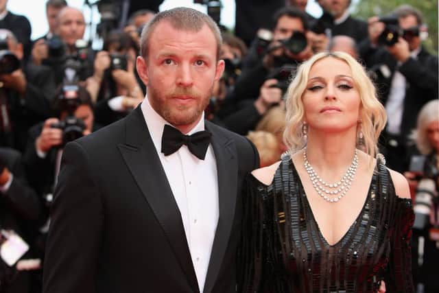  Madonna and husband director Guy Ritchie arrive at the  'I Am Because We Are'  Premiere at the Palais des Festivals during the 61st International Cannes Film Festival on May 21, 2008 in Cannes, France.  (Photo by Sean Gallup/Getty Images)