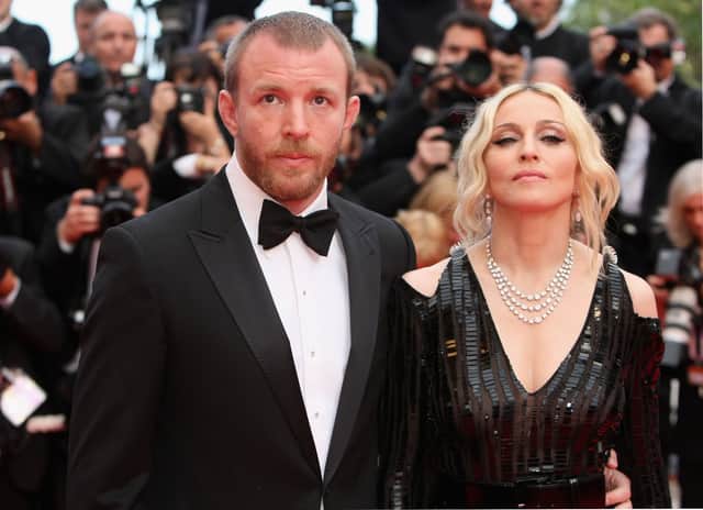  Madonna and husband director Guy Ritchie arrive at the  'I Am Because We Are'  Premiere at the Palais des Festivals during the 61st International Cannes Film Festival on May 21, 2008 in Cannes, France.  (Photo by Sean Gallup/Getty Images)