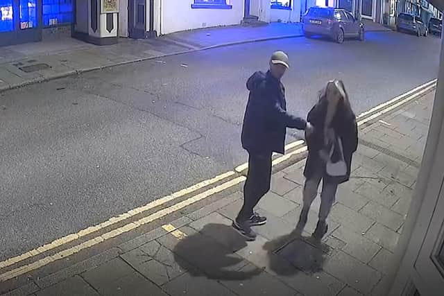 Screengrah taken from handout CCTV issued by the Crown Prosecution Service (CPS) of Lewis Haines with Lily Sullivan after he met her inside a nightclub in Pembroke.