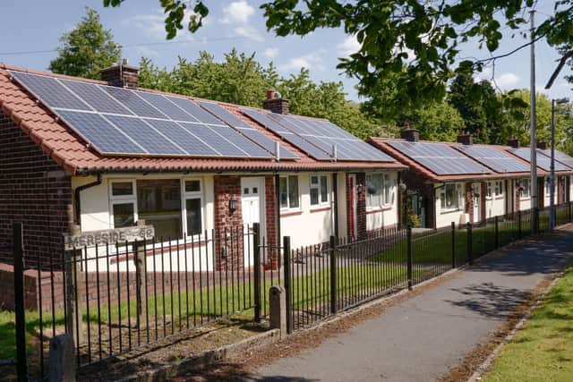 Solar panels are seen on the houses in Mereside Grove in Worsley on May 16, 2019 in Salford, England (Photo by Anthony Devlin/Getty Images)