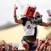 A music fan soaks up the atmosphere at Reading Festival.  (Photo by Simone Joyner/Getty Images)