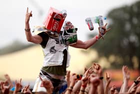 A music fan soaks up the atmosphere at Reading Festival.  (Photo by Simone Joyner/Getty Images)