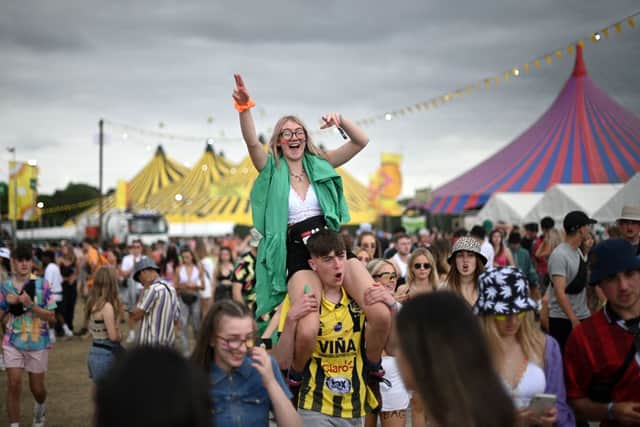 Festival-goers attend Reading Festival in Reading, west of London, on August 27, 2021 (Photo by DANIEL LEAL/AFP via Getty Images)