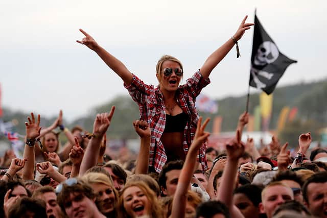 A fan soaks up the atmopshere during the Reading Festival 2012 at Richfield Avenue on August 26, 2012 in Reading, England.  (Photo by Simone Joyner/Getty Images)