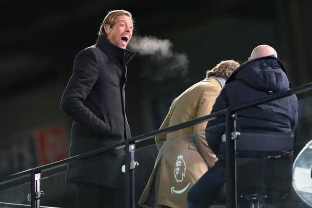 Former England players and Amazon TV Pundits Peter Crouch (L) and Alan Shearer share a joke during the Premier League match between Newcastle United and Liverpool at St. James Park on December 30, 2020 in Newcastle upon Tyne, England. (Photo by Stu Forster/Getty Images)