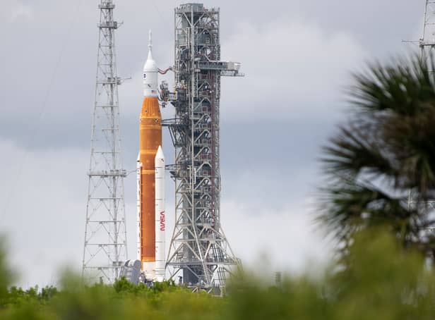 <p>NASA’s Space Launch System (SLS) rocket with the Orion spacecraft aboard is seen atop a mobile launcher at Launch Pad 39B as preparations for launch continue at NASA’s Kennedy Space Center on August 28, 2022, in Cape Canaveral, Florida. (Photo by Joel Kowsky/NASA via Getty Images)</p>